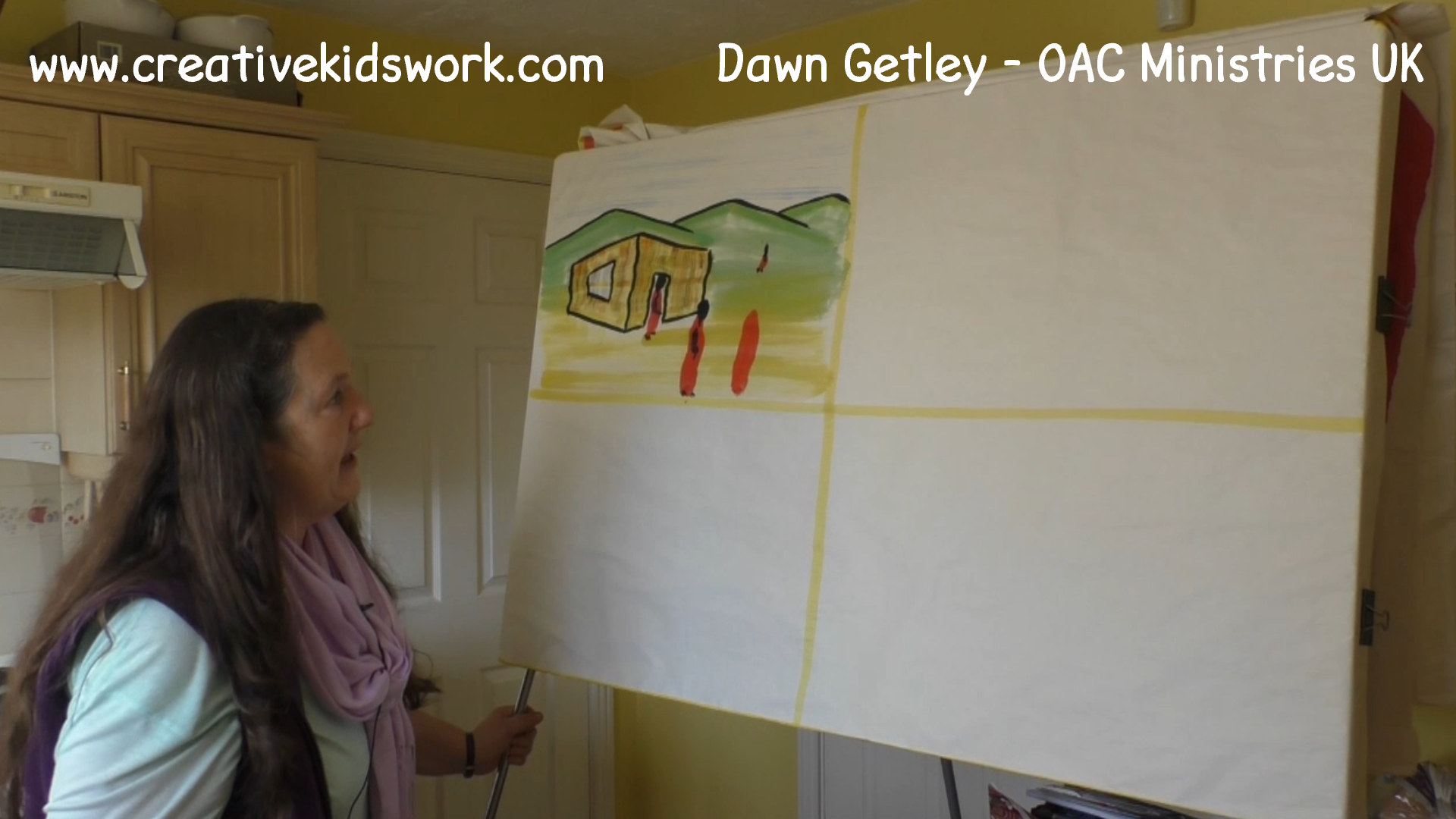Dawn Getley demonstrates how to paint a general landscape with a house in it on a sketchboard painting