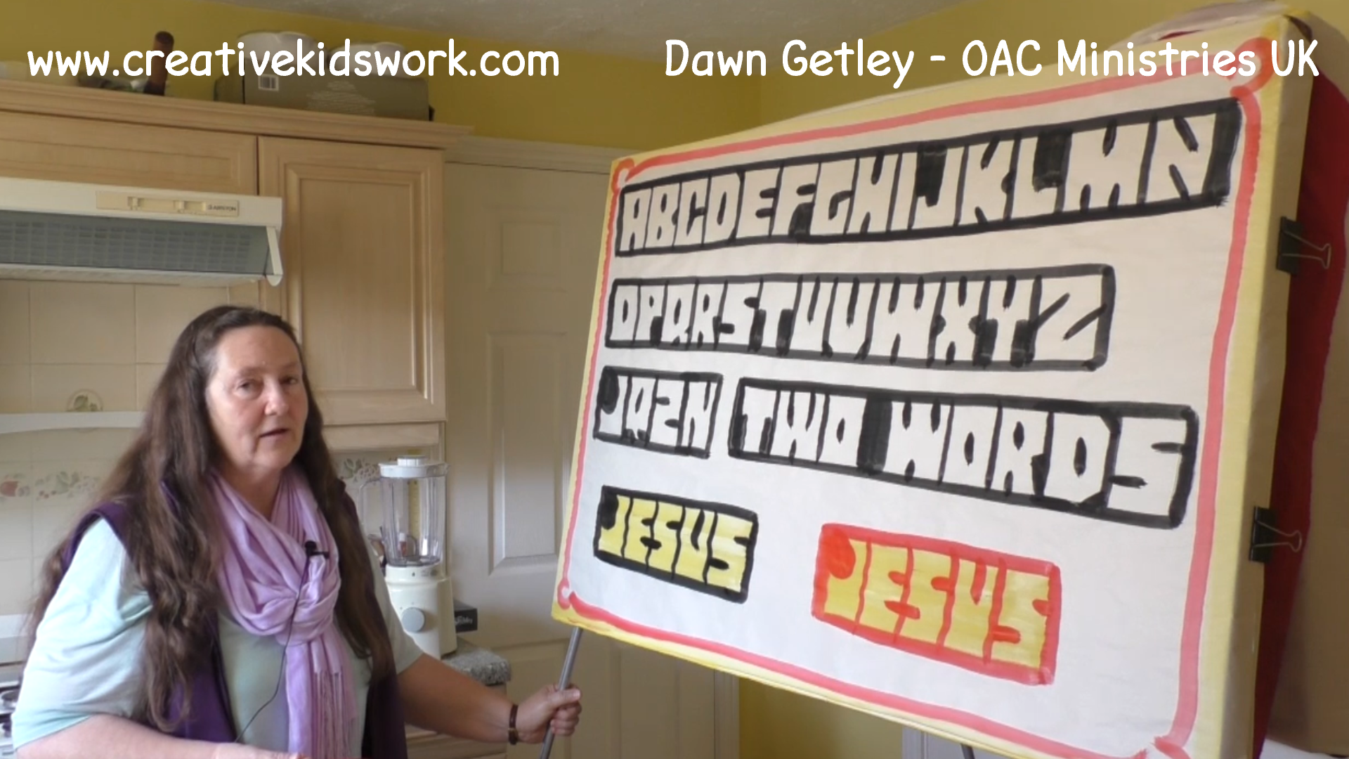 Dawn Getley demonstrates how to paint ladder letters on a sketchboard painting